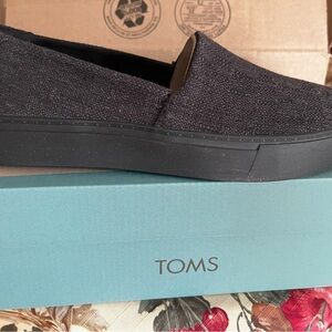 Brand new Toms slip one